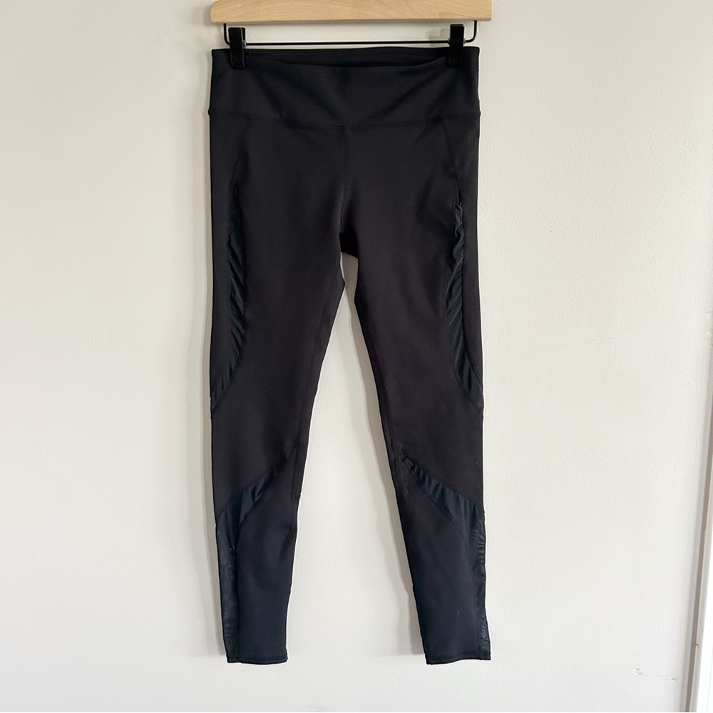Fabletics • black leggings with mesh panels